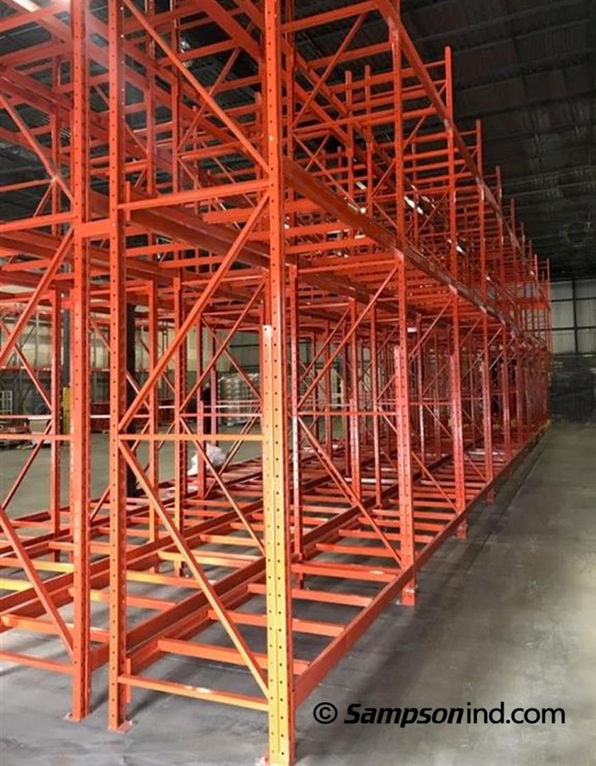 Two rows of pallet Redirack racking joined by row spacers that enhance stability.